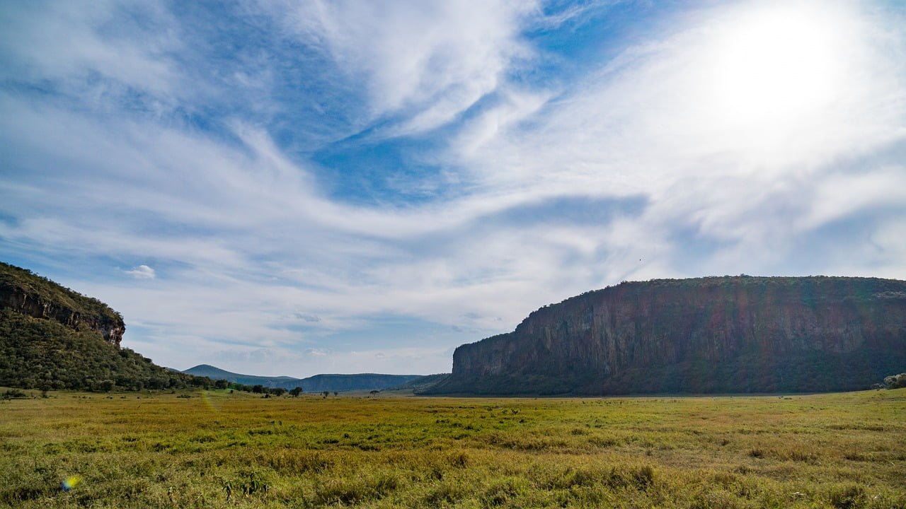 Aerial view of Hell's Gate National Park with rugged terrain and volcanic formations.